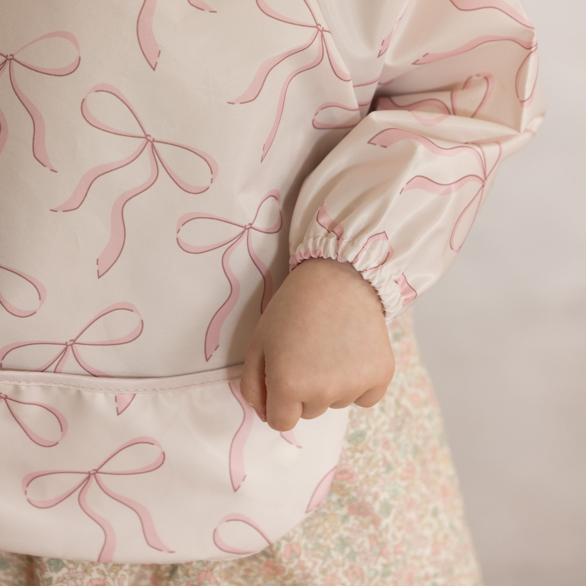 Tiny Twinkle - Mess - Proof Full Sleeve Bib - Bows - Small for 6 - 24 Months