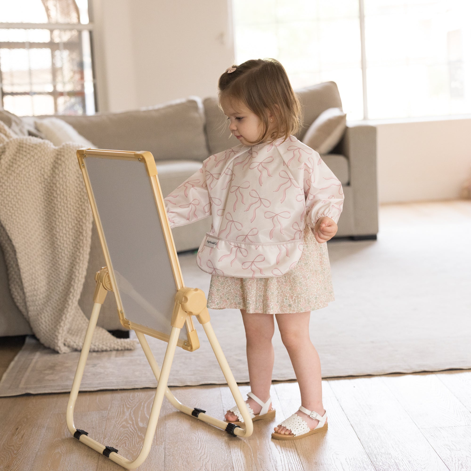 Tiny Twinkle - Mess - Proof Full Sleeve Bib - Bows - Small for 6 - 24 Months